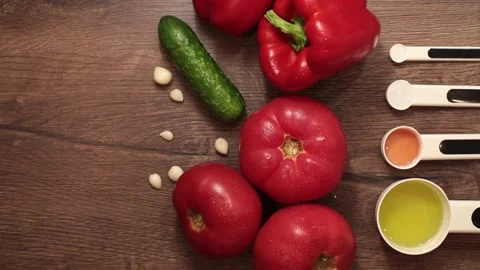 Vegetables on the table: peppers tomatoes cucumber garlic Stock Footage 142302039