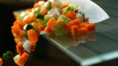 Vegetables tossed of cutting board Stock Footage 120461889
