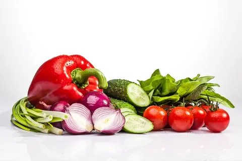 Vegetables on the white background Stock Photos