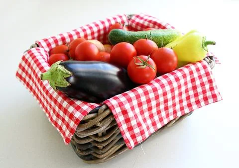 Vegetables in wicker basket Stock Photos