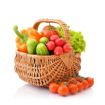 Vegetables in the wicker basket Stock Photos