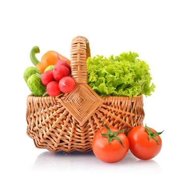 Vegetables in the wicker basket Stock Photos