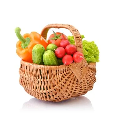 Vegetables in the wicker basket Stock Photos