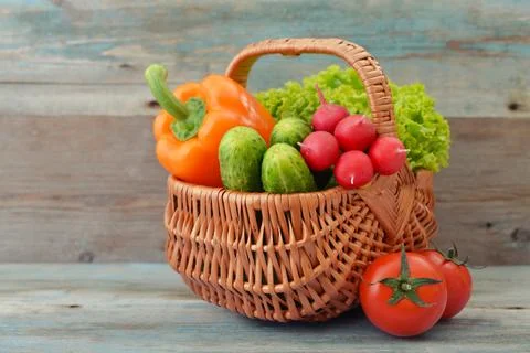 Vegetables in the wicker basket Stock Photos