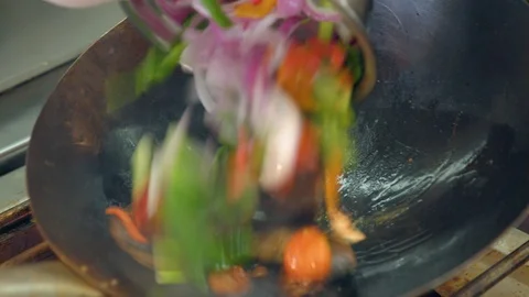 Vegetables in wok Stock Footage 89117743