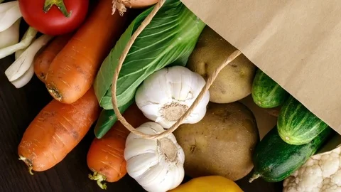 Vegetables on wood background with space for text. Organic food. Stock Footage 72672812