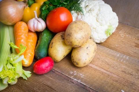 Vegetables on wooden background Stock Photos