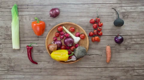 Vegetables on wooden plate Stock Footage 63245541
