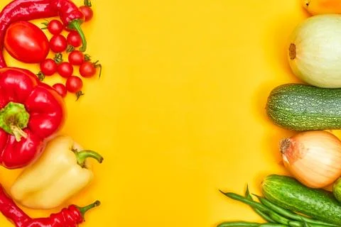 Vegetables on yellow background, copy space Stock Photos