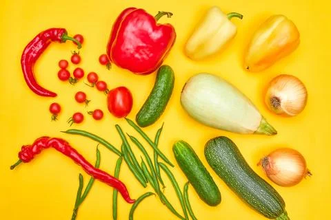 Vegetables on yellow background, flatlay one Stock Photos