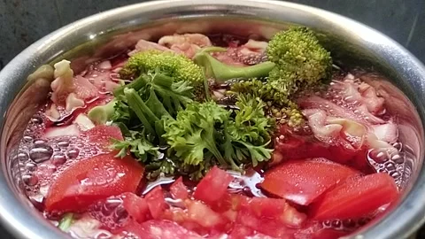 Vegetaibles  boiling Stock Footage 233096309