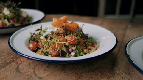 Vegetarian Dish Being Set on The Table Video stock 131856021