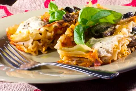 Vegetarian lasagna dinner Stock Photos