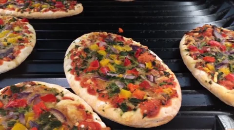 A vegetarian mini pizza Stock Footage 64583282