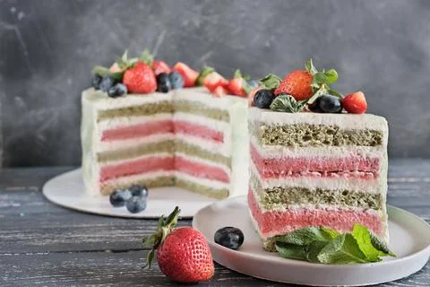 Vegetarian non dairy cake. multi layered matcha and strawberry dessert with.. Stock Photos