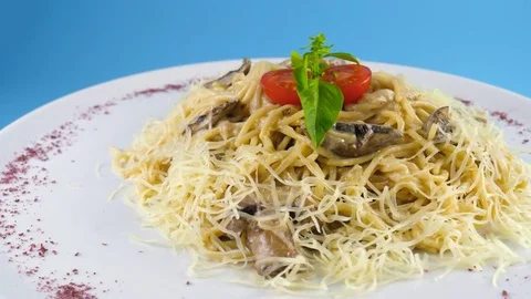 Vegetarian Pasta or Spaghetti with champignons, parmesan cheese Stock Footage 78665937