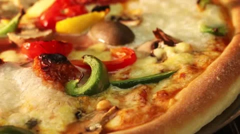 A vegetarian pizza in an oven (close-up) Stock-Footage 24672235