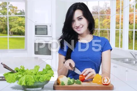 Vegetarian Woman Makes Salad
