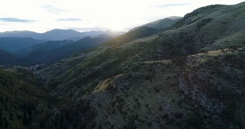 Vegetation growing at different rates on mountain side drone aerial 4k Stock Footage 125756780