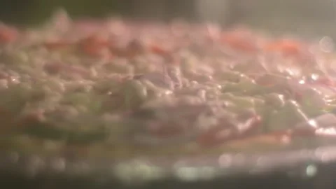 Veggie Pizza Cooking in the Oven Stock Footage 130357436
