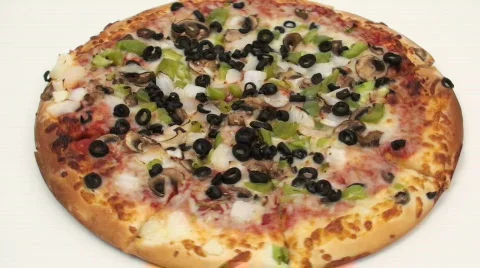 Veggie pizza seamless loop high angle - HD  Stock Footage 448894