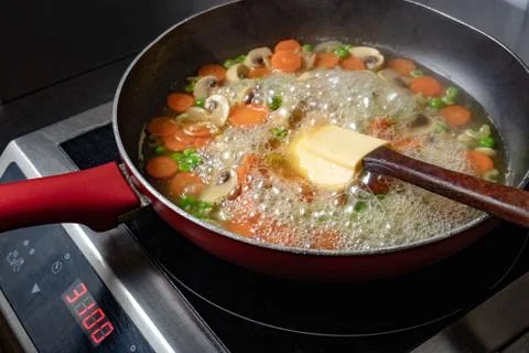 Veggies cooked in the pan Stock Photos
