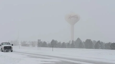 Vehicels Drive on Snow Covered and Icy Roads Stock Footage 54751663