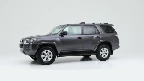 Vehicle bodywork in studio Blue Eclipse Metallic 2020 Toyota 4Runner SR5 Premium Stock Footage 159376876