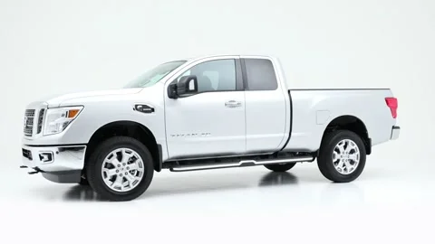 Vehicle bodywork in studio Florett Silver Metallic 2017 Nissan Titan XD SV Stock Footage 159384073