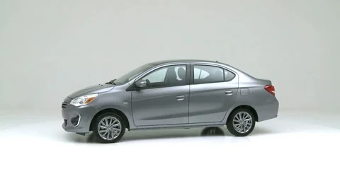 Vehicle bodywork in studio Ice Silver Metallic 2017 Mitsubishi Mirage G4 SE Stock Footage 159386580