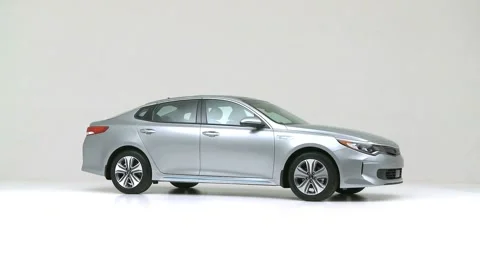 Vehicle bodywork in studio Obsidian Blue Pearl 2017 Kia Optima Plug-In Hybrid EX Stock Footage 159530809