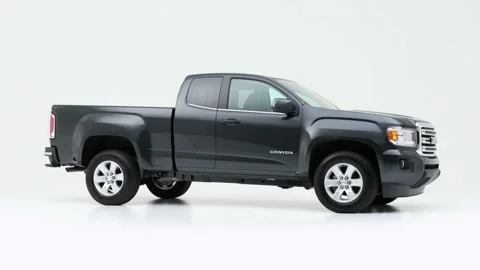 Vehicle bodywork in studio Shimmering Silver Metallic 2018 GMC Canyon SLE Stock Footage 159534467