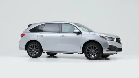 Vehicle bodywork in studio Titanium Glow 2019 Acura MDX with A-Spec Package Stock Footage 159535856
