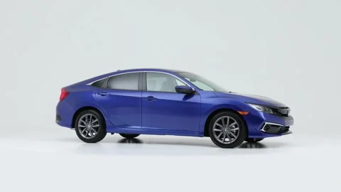 Vehicle bodywork in studio White Platinum Metallic Tri-Coat 2019 Honda Civic EX Stock Footage 159536552