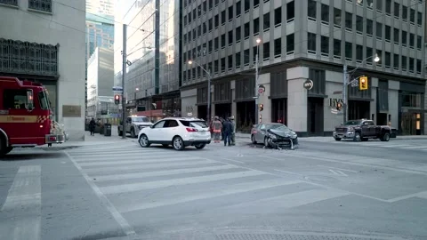Vehicle Collision at Downtown Urban Intersection with Paramedics, Fire 動画素材 168785756