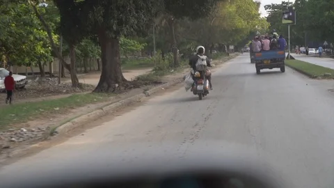 Vehicle driving on road Stock Footage 85780803