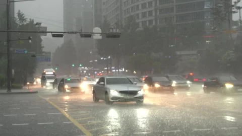 A vehicle driving through heavy rain Stock Footage 333085593