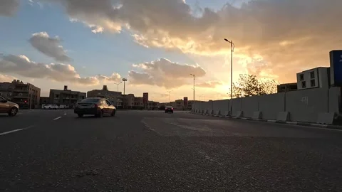 Vehicle Driving Through New Cairo Streets Showing Urban Buildings Traffic And Stock Footage 329658143