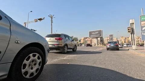 Vehicle Driving Through New Cairo Streets Showing Urban Buildings Traffic And Stock Footage 329800681