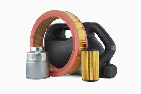 Vehicle engine round air filter, fuel and oil filters near motor oil can 스톡 사진