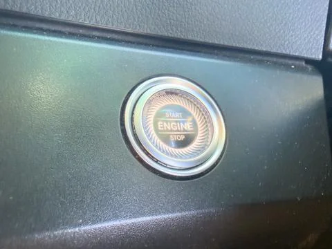 Vehicle engine start stop button macro 写真素材