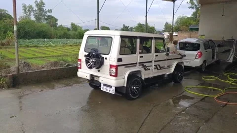 A vehicle is exist from the service station after washing. Stock Footage 143408557