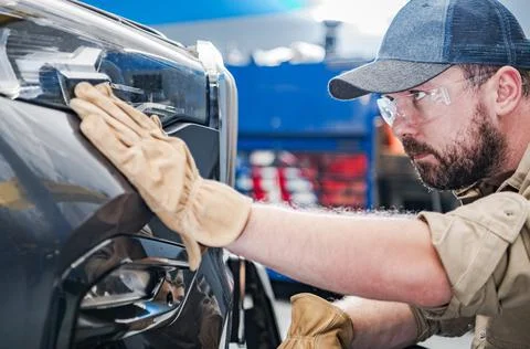 Vehicle Front LED Lighting Issue Check by Professional Automotive Worker Photos