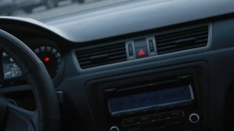 Vehicle interior. Close up of car interior, srteering wheel. Slow motion Vídeo Stock 104884995