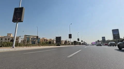 Vehicle Moving Across Active Urban District Streets New Cairo Showing Buildings Stock Footage 329851285
