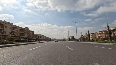 Vehicle Moving Through Bright Urban Roads New Cairo Showing Buildings Traffic Stock Footage 330114433