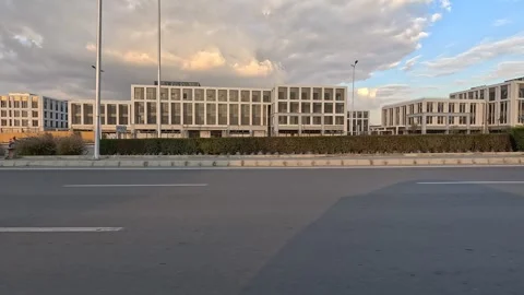 Vehicle Moving Through Lively District Streets New Cairo Showing Buildings Видео 329946894