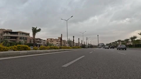 Vehicle Moving Through Spacious Urban Streets New Cairo Showing Buildings Stock Footage 330099647