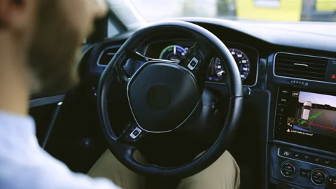 Vehicle parallel parking by itself in suburban town street. Self-steering Stock Footage 200876385