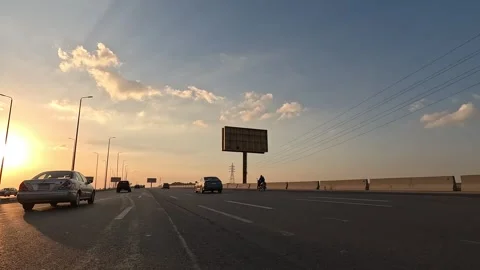 Vehicle Passage Through Cairo Ain Sokhna Desert Corridor With Active Traffic Stock Footage 329969408